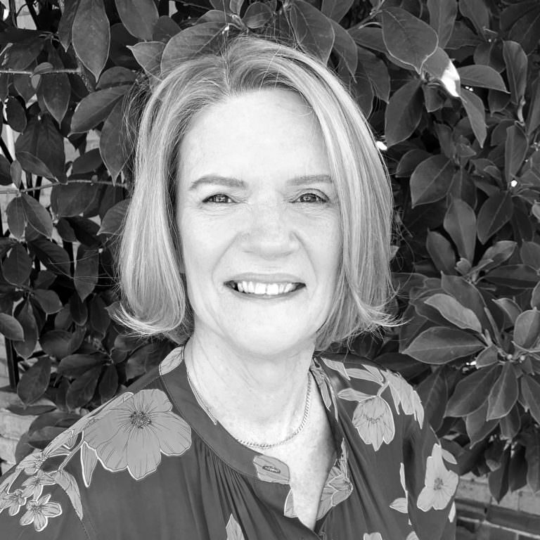 Black and white photo of Associate, Lee Deveridge