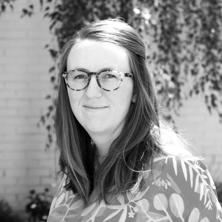 Black and white photo of Associate, Kate Woodman