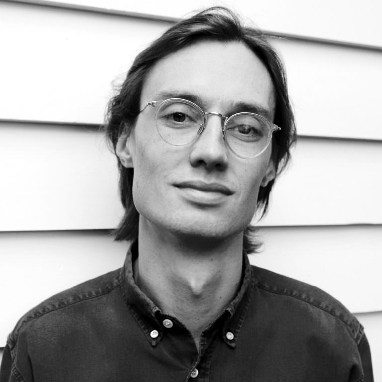 Black and white photo of Alex Gibson