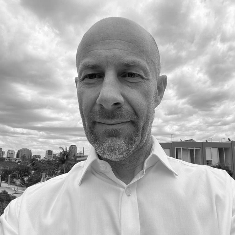 Black and white photo of Director, Adrian Stanic